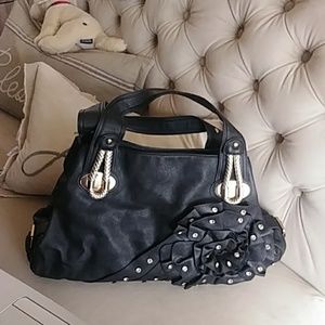 Black studded handbag